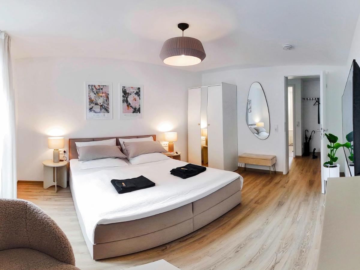 LIGHTPLACE • Design • Boxspring • Balkon • 2 Smart TV •Innenstadt - Housity