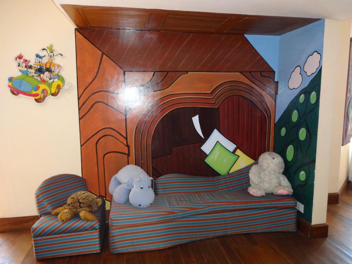 a childs bed with stuffed animals in a room at The Oberoi Cecil in Shimla