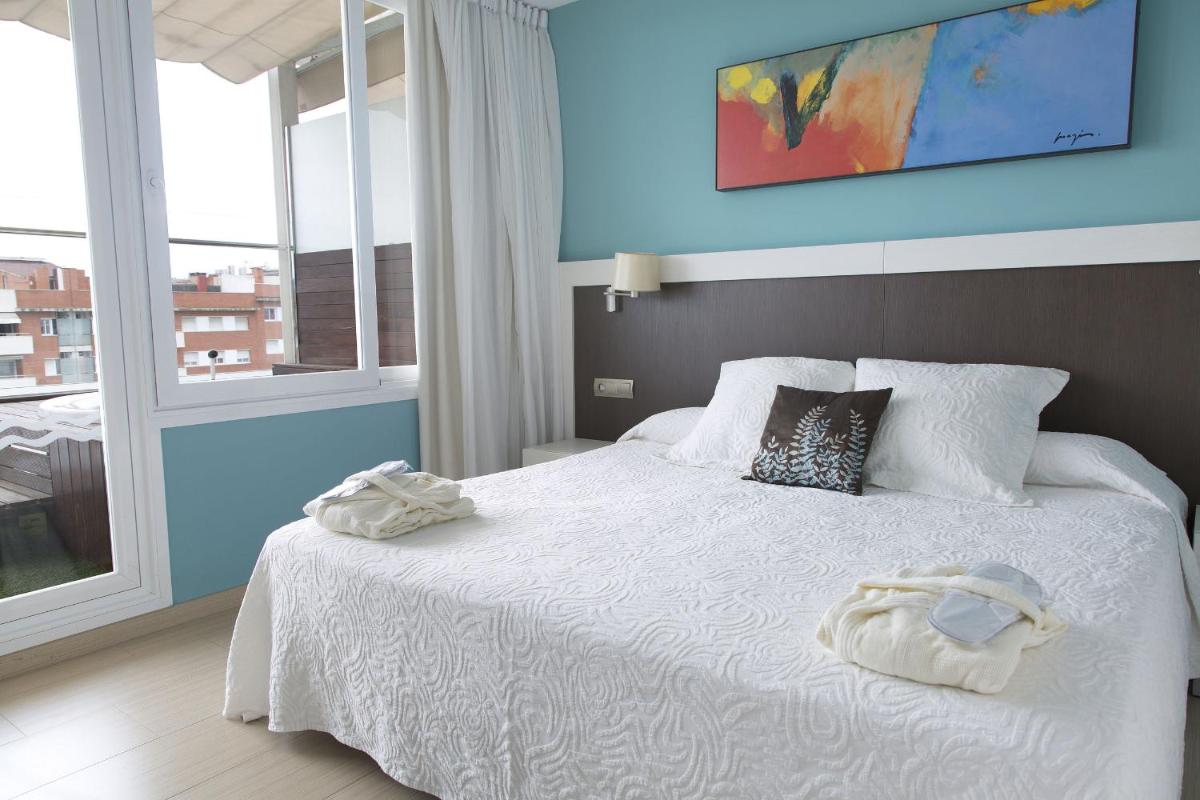 Cama o camas de una habitación en GHT Oasis Park & Spa