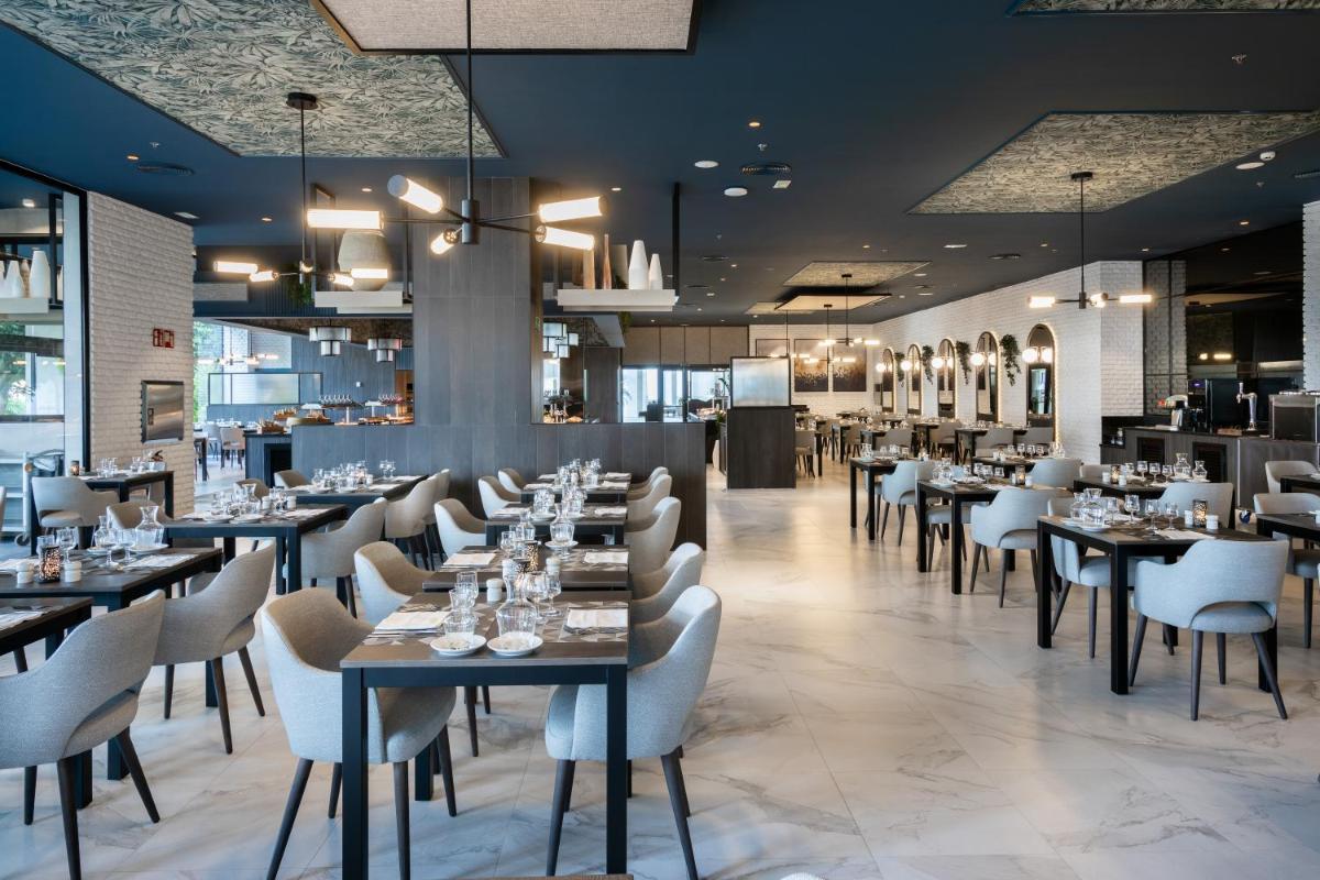 Un restaurante o sitio para comer en Hotel Riu Gran Canaria - All Inclusive
