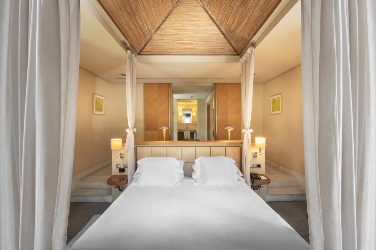 Cama o camas de una habitación en The Villas at Bahia del Duque