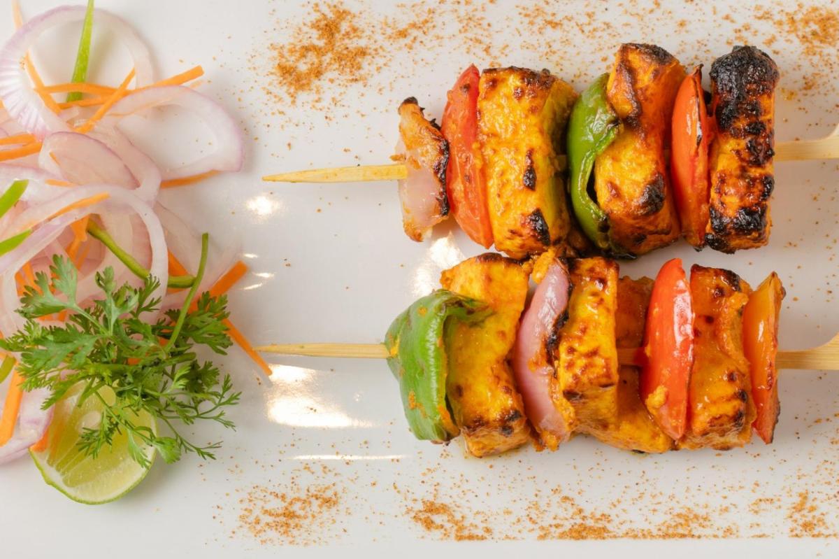 a plate of food with meat and vegetables on it at Southern Star,Mysore in Mysore