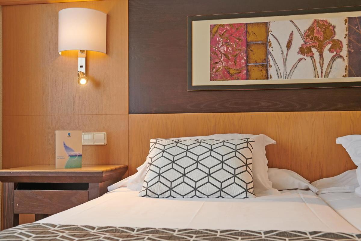 Cama o camas de una habitación en Grupotel Nilo & Spa