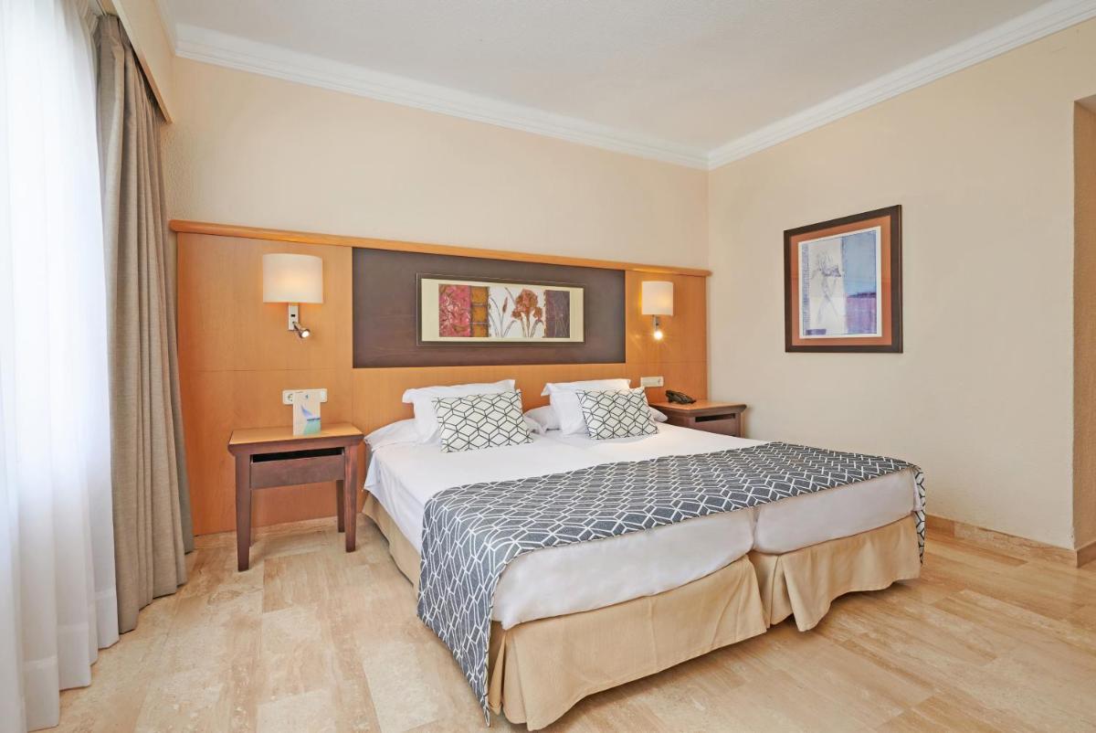 Cama o camas de una habitación en Grupotel Nilo & Spa