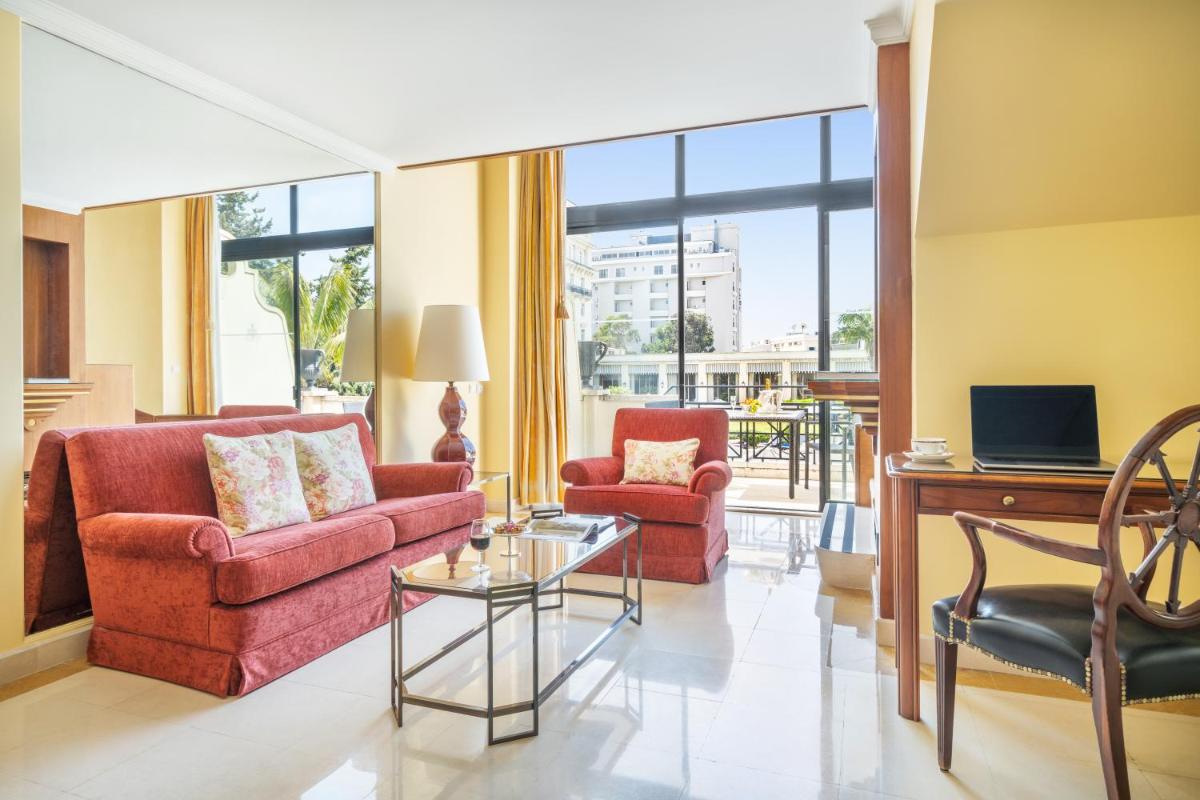 Uma área de estar em Palácio Estoril Hotel, Golf & Wellness
