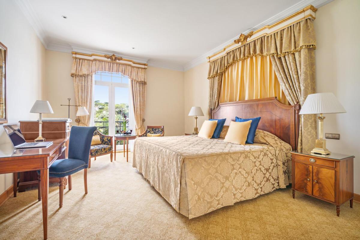 Uma cama ou camas num quarto em Palácio Estoril Hotel, Golf & Wellness