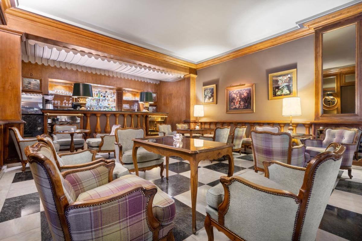 Uma área de estar em Palácio Estoril Hotel, Golf & Wellness