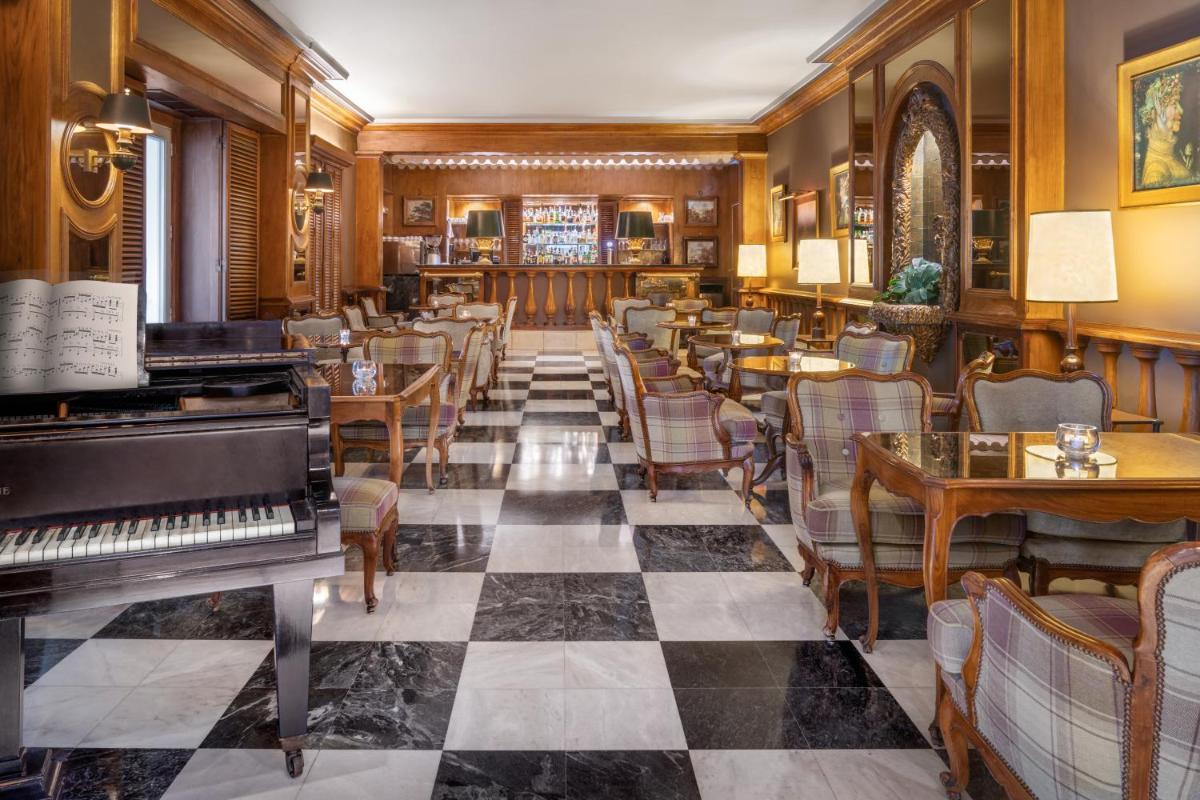 Uma área de estar em Palácio Estoril Hotel, Golf & Wellness