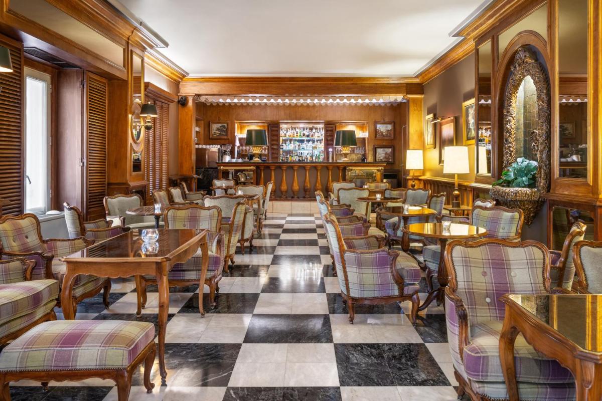 Uma área de estar em Palácio Estoril Hotel, Golf & Wellness