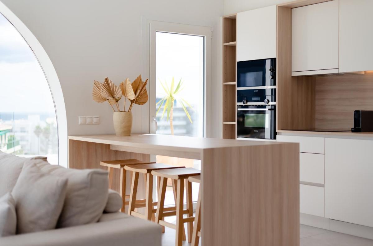 Una cocina o zona de cocina en Portomar Apartments - 4-Star Superior Hotel