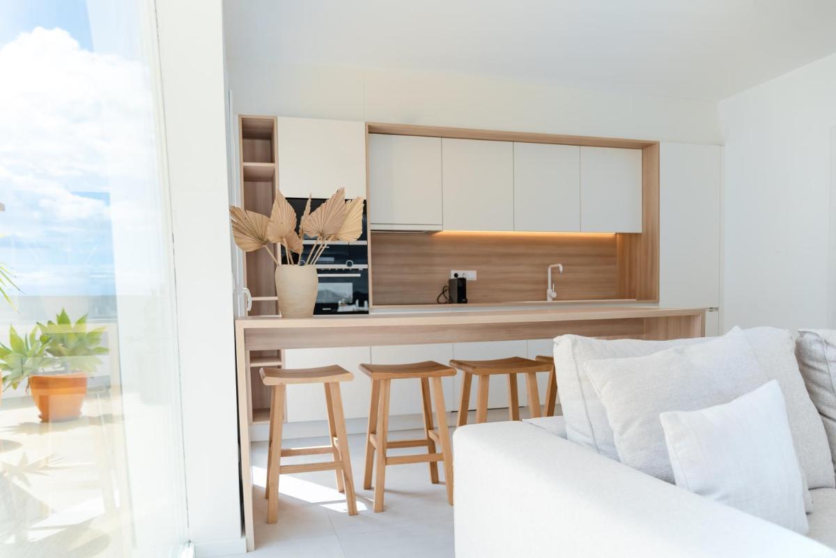 Una cocina o zona de cocina en Portomar Apartments - 4-Star Superior Hotel