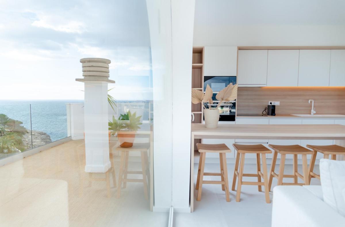 Una cocina o zona de cocina en Portomar Apartments - 4-Star Superior Hotel