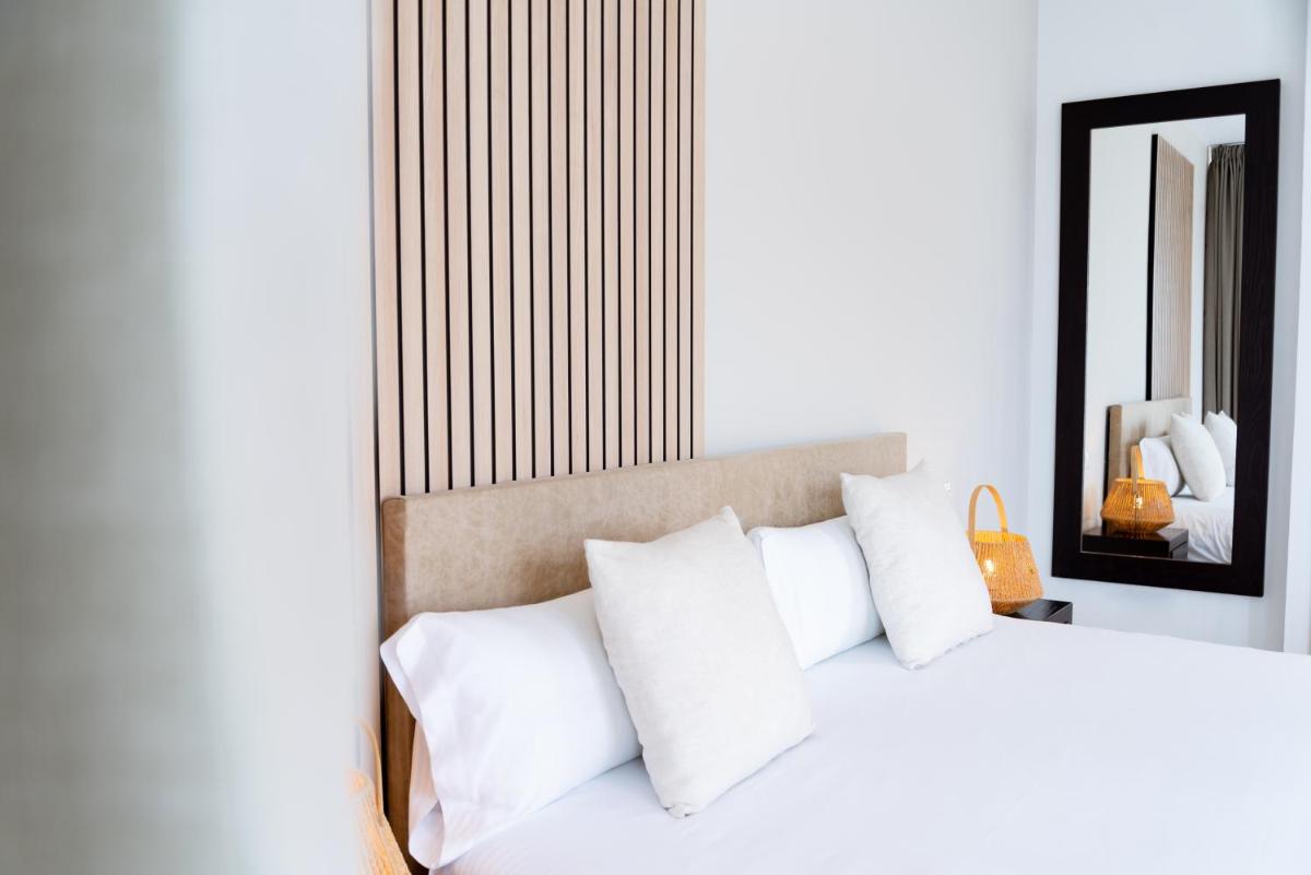 Cama o camas de una habitación en Portomar Apartments - 4-Star Superior Hotel