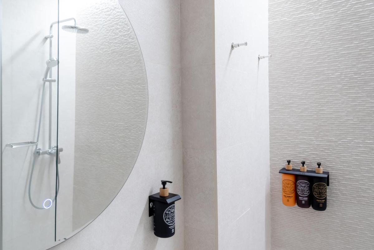 Un baño de Portomar Apartments - 4-Star Superior Hotel
