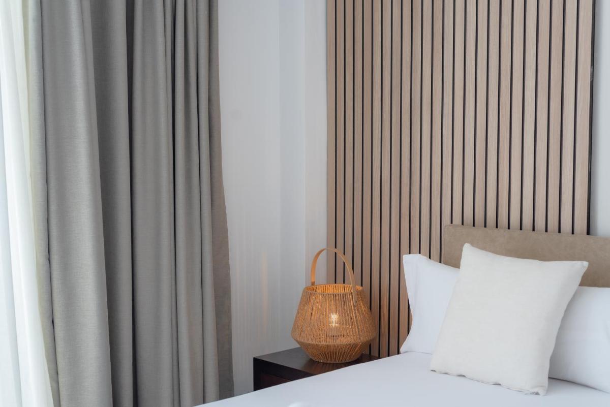 Cama o camas de una habitación en Portomar Apartments - 4-Star Superior Hotel