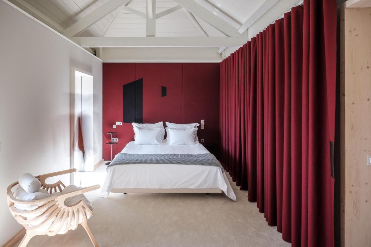 Uma cama ou camas num quarto em Casa de São Lourenço - Burel Panorama Hotel - member of Design Hotels