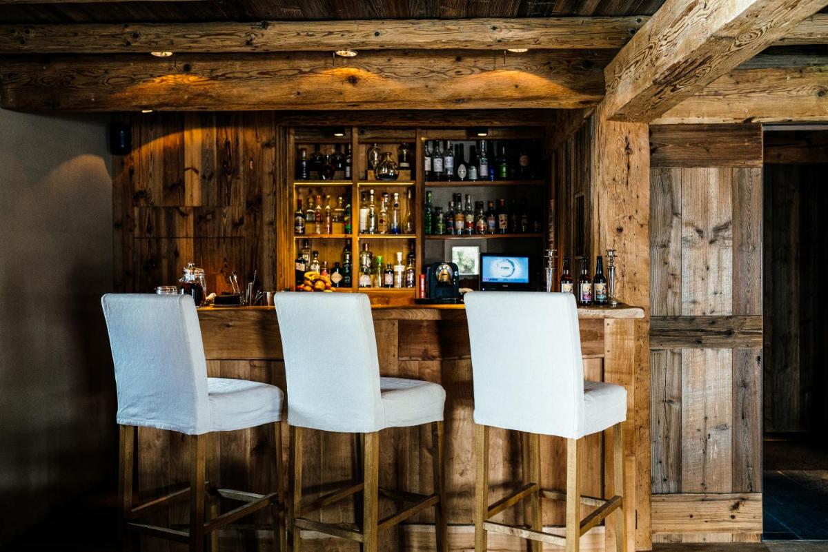 Salon ou bar de l'établissement Zannier Le Chalet