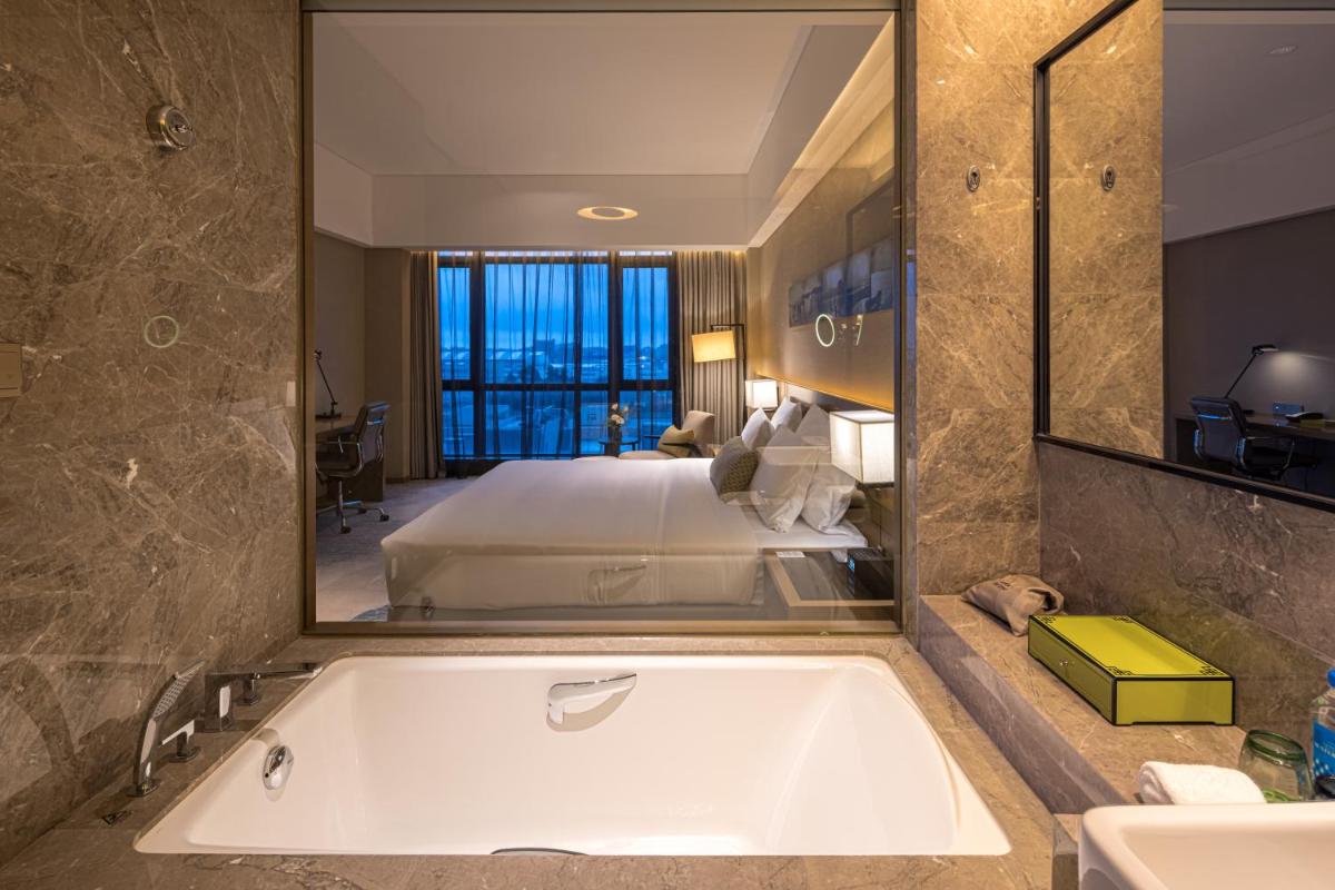 Wyndham JinJiang Hotel - Housity