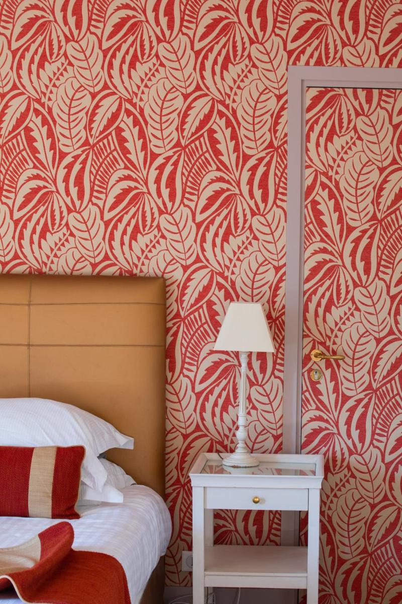 Un ou plusieurs lits dans un hébergement de l'établissement Hôtel & Spa de La Bretesche