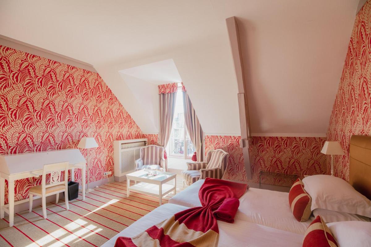 Un ou plusieurs lits dans un hébergement de l'établissement Hôtel & Spa de La Bretesche