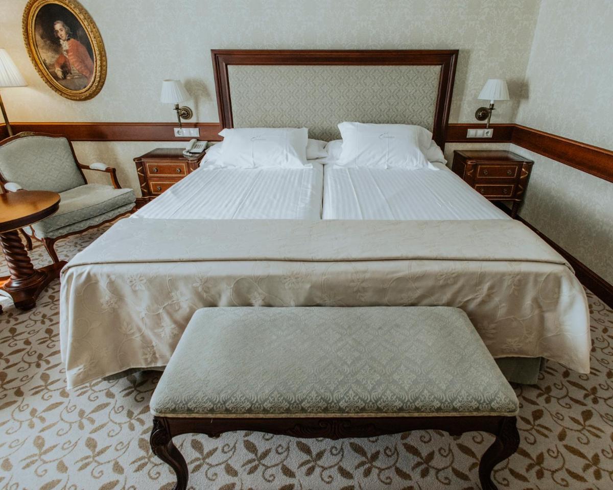 Cama o camas de una habitación en Hotel Cándido