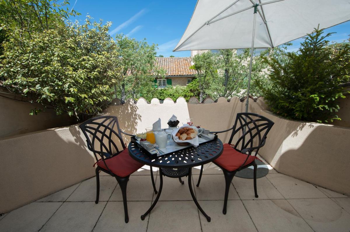 Terrasse ou espace extérieur de l'établissement Auberge de Cassagne & Spa