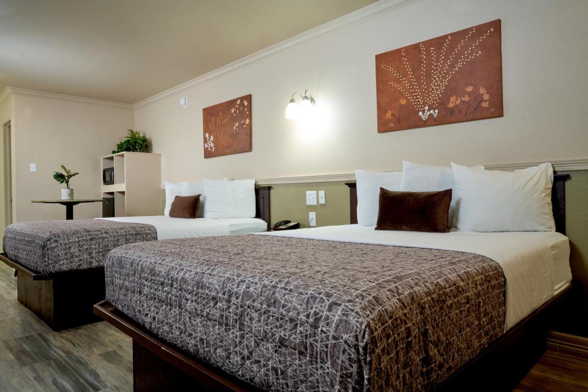 Family Garden Inn & Suites - Housity