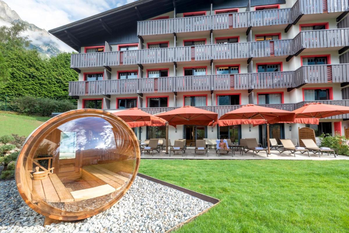 Jardin de l'établissement Chalet Hôtel Le Prieuré & Spa