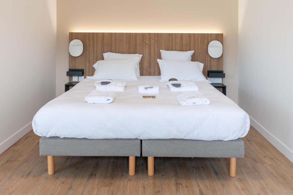 Un ou plusieurs lits dans un hébergement de l'établissement Villa Thermae Nancy