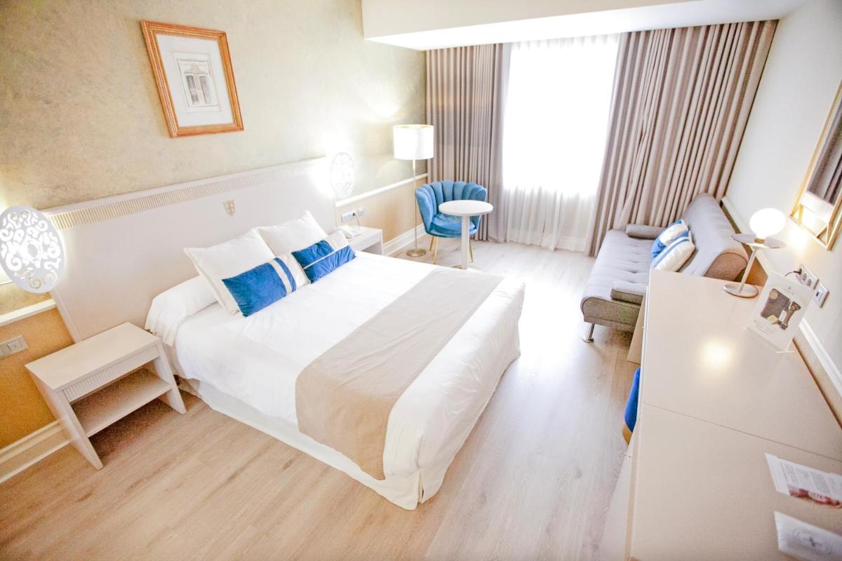 Cama o camas de una habitación en Hotel Alfonso VIII