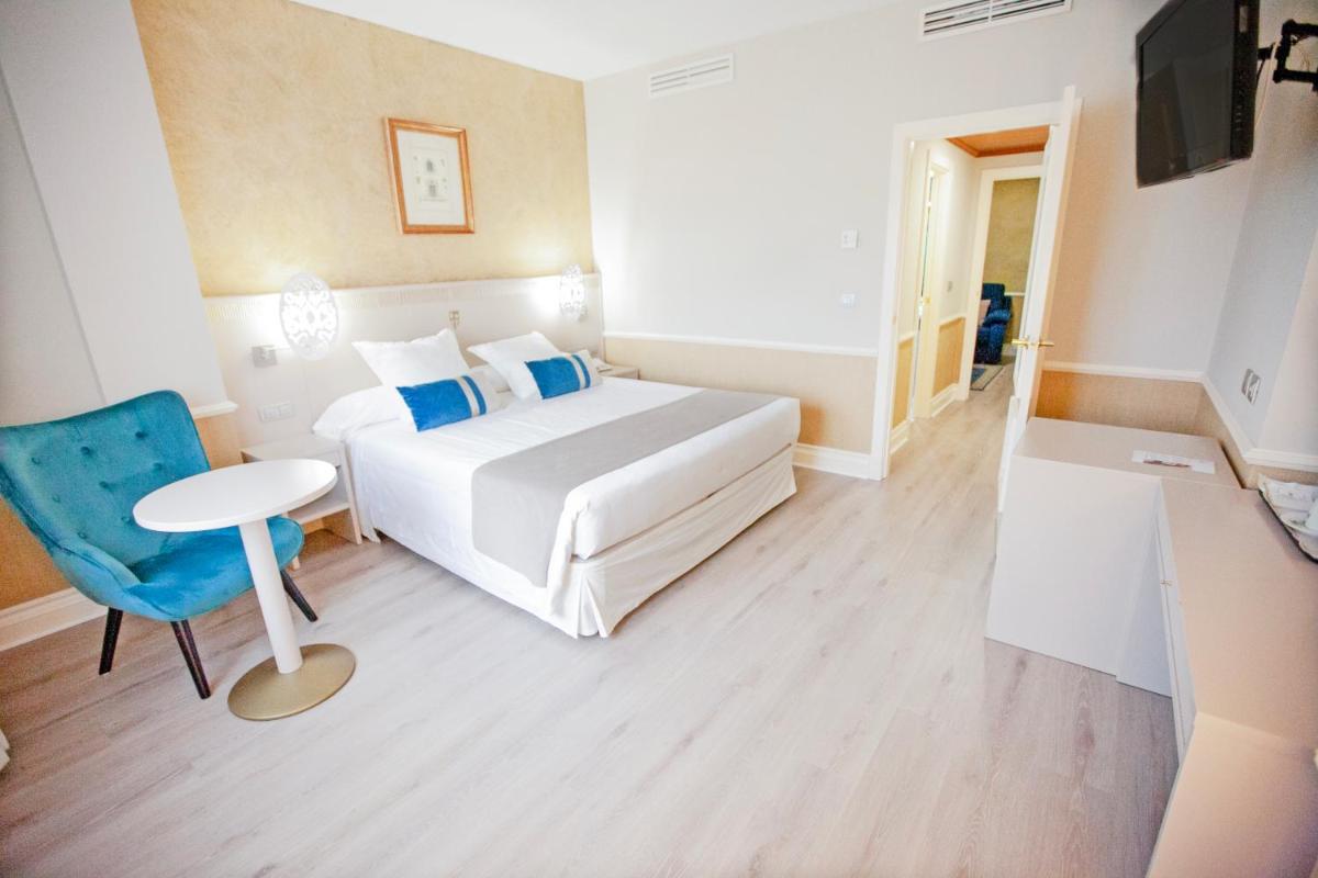 Cama o camas de una habitación en Hotel Alfonso VIII