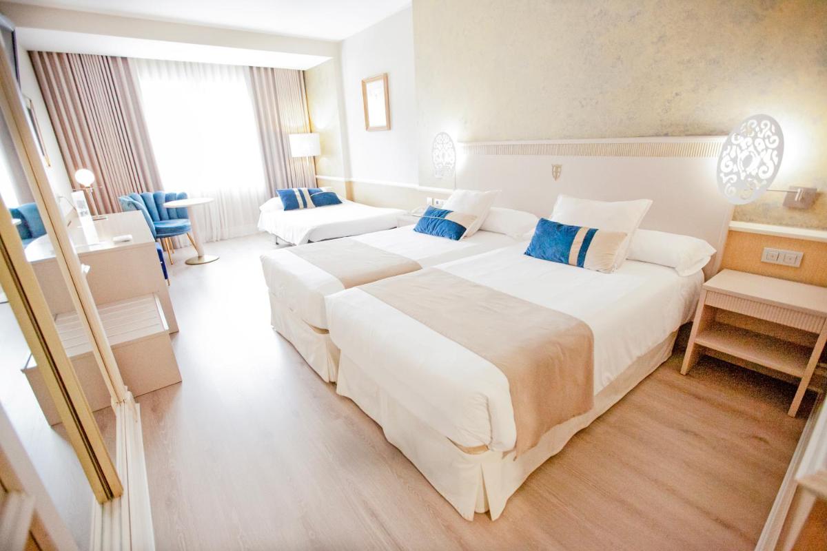 Cama o camas de una habitación en Hotel Alfonso VIII