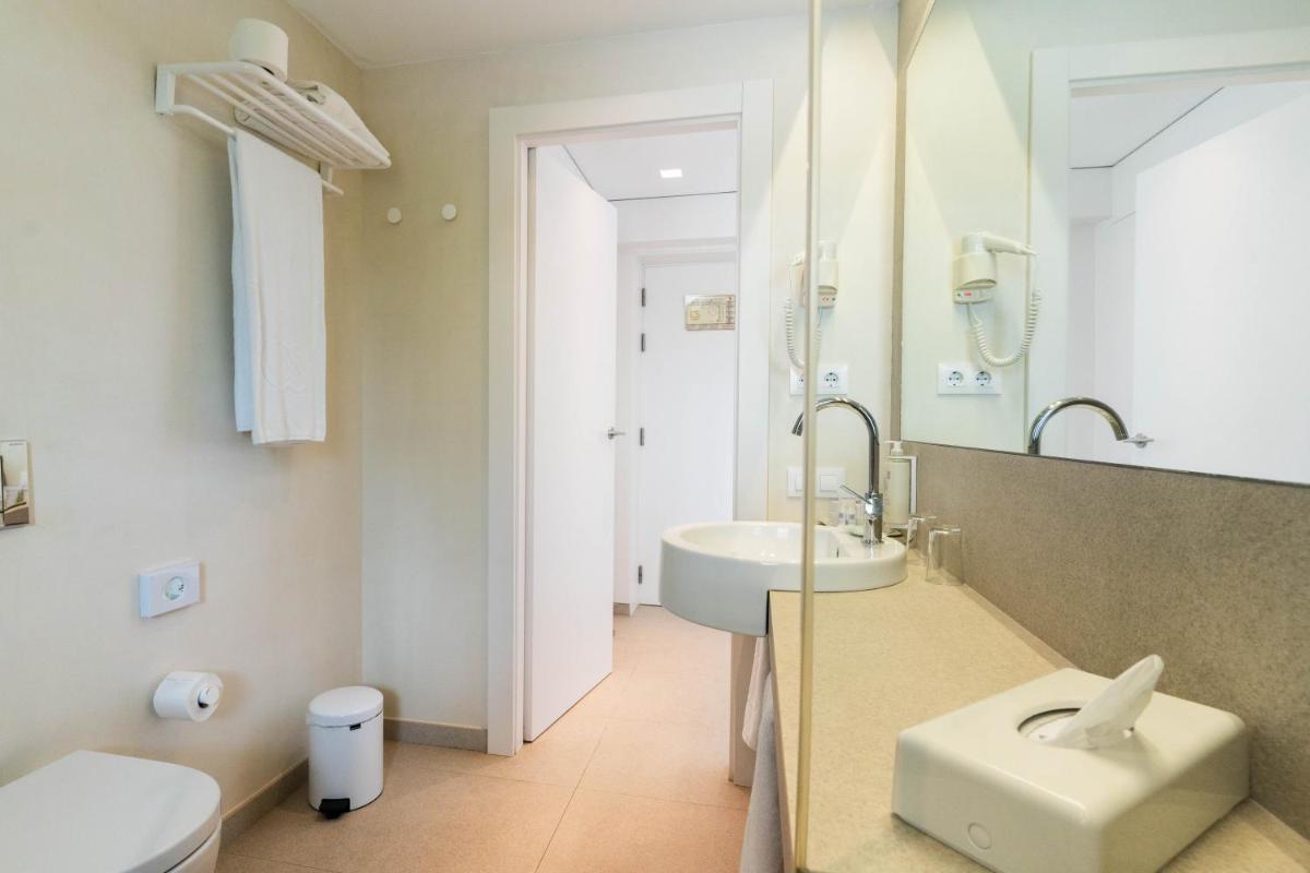 Un baño de Hotel Cala Saona & Spa