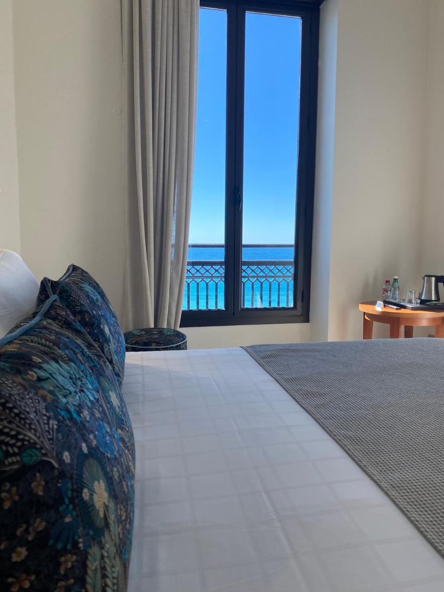 Un ou plusieurs lits dans un hébergement de l'établissement Westminster Hotel & Spa Nice