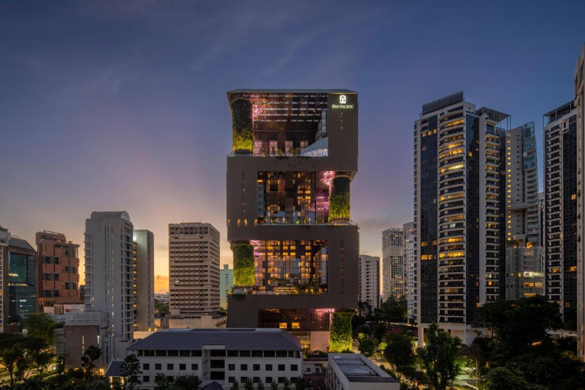 a view of a city skyline with tall buildings at Pan Pacific Orchard in Singapore