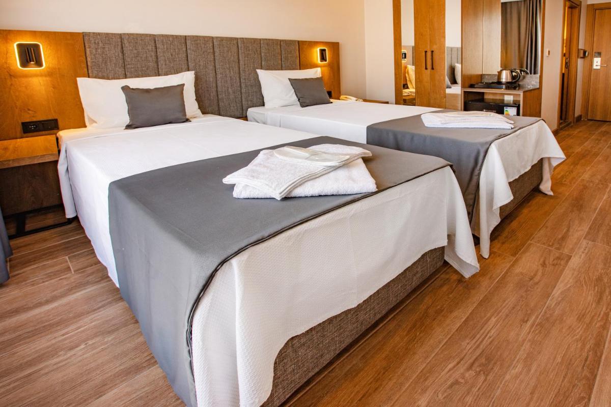 Grand Business Hotel - Housity