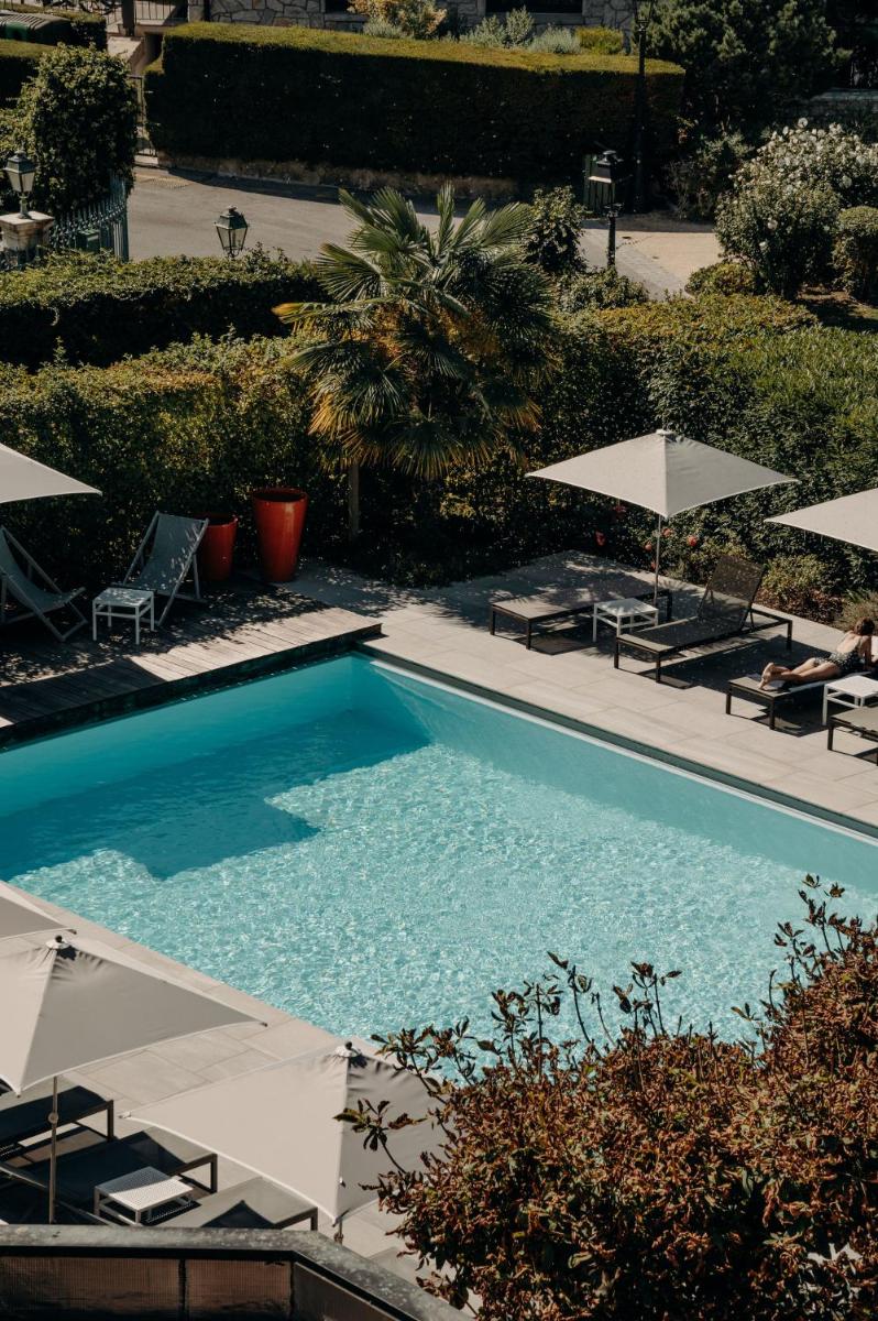 Piscine de l'établissement Hotel Le Cottage Bise ou située à proximité