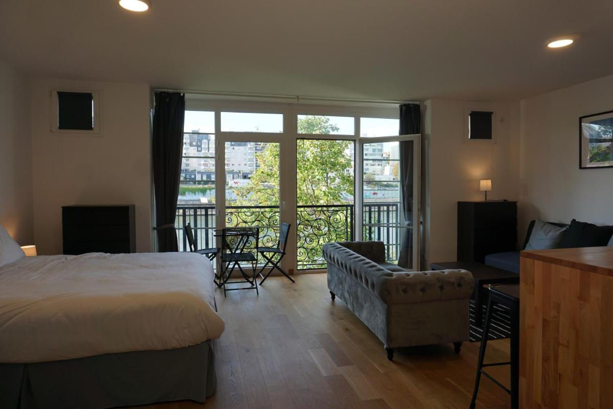 Résidences Grande Jatte, Face Seine, Suites Luxe 52m2 à 97m2, Hôpital Américain à 600m - Housity