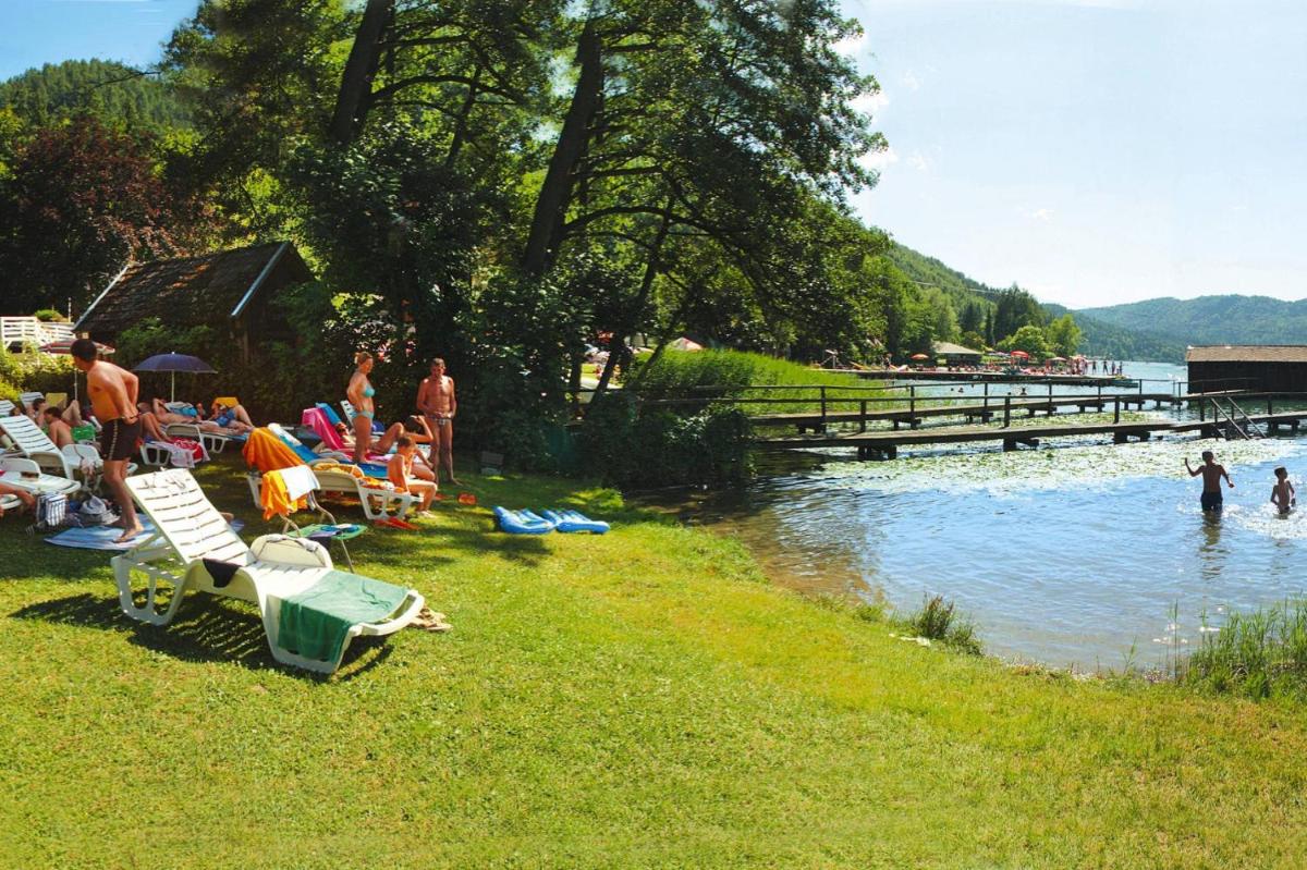 Sunny holiday apartment with balcony on Klopeinersee with private beach - Housity