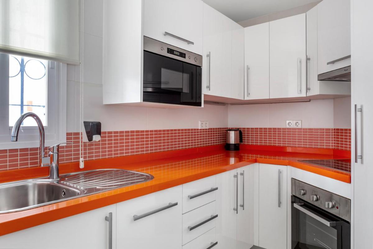 Una cocina o zona de cocina en Sahara Sunset