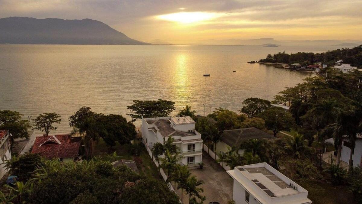 Praia por do sol sossego e exclusividade - Housity