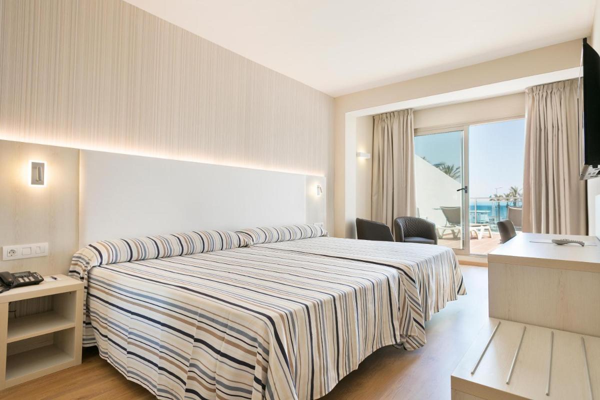 Cama o camas de una habitación en Hotel Best Sabinal