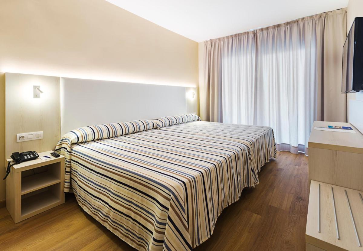 Cama o camas de una habitación en Hotel Best Sabinal