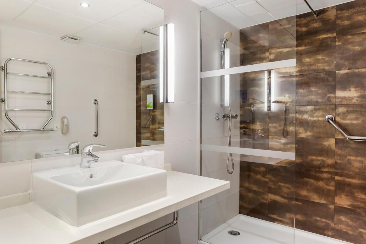 Un baño de Los Amigos Beach Club