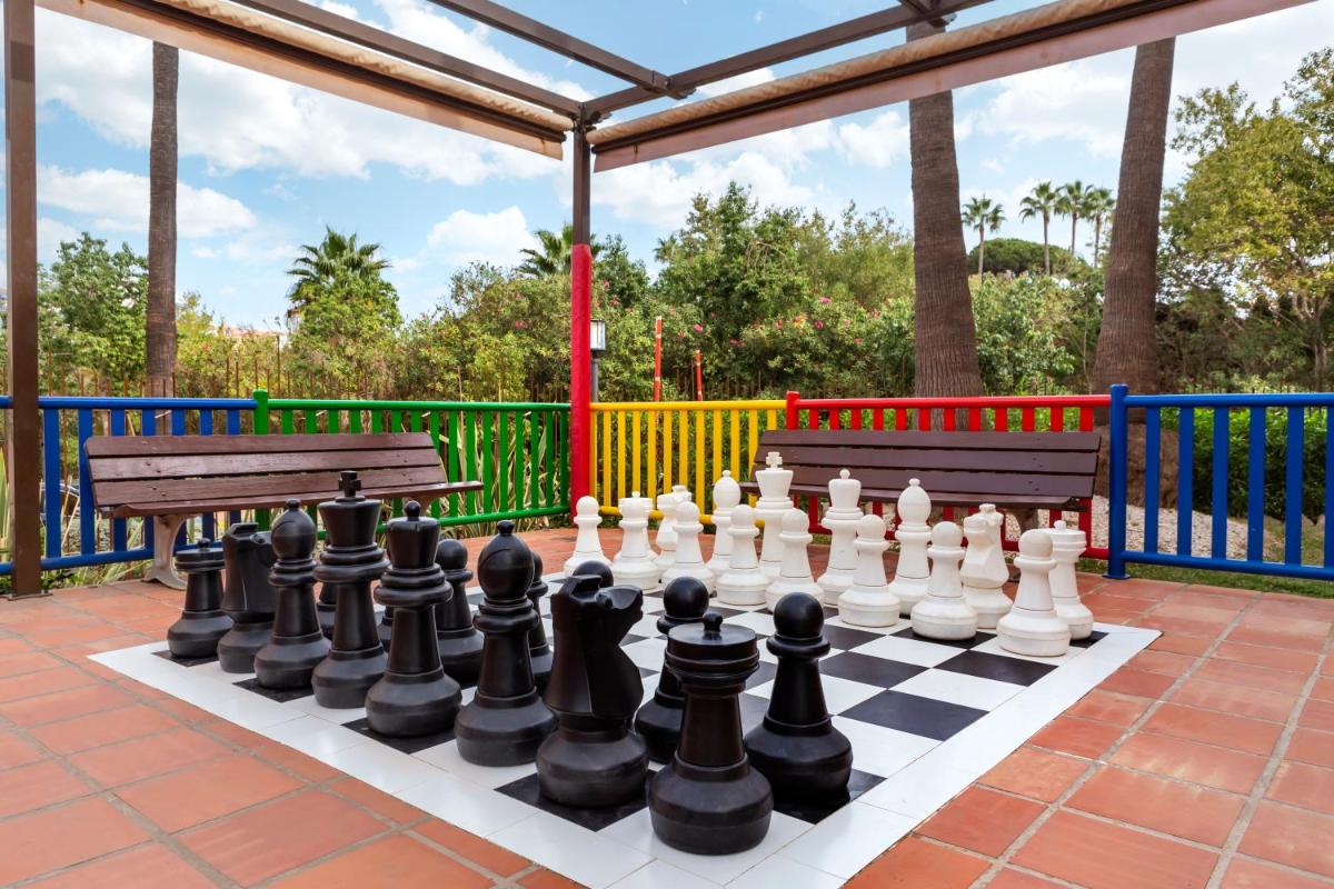 Jardín al aire libre en Los Amigos Beach Club