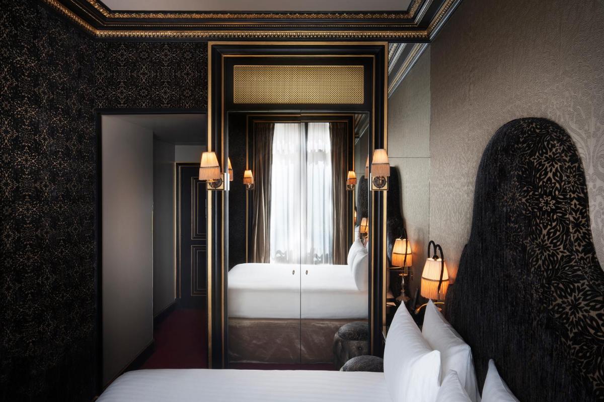 Un ou plusieurs lits dans un hébergement de l'établissement Maison Souquet, Hotel & Spa