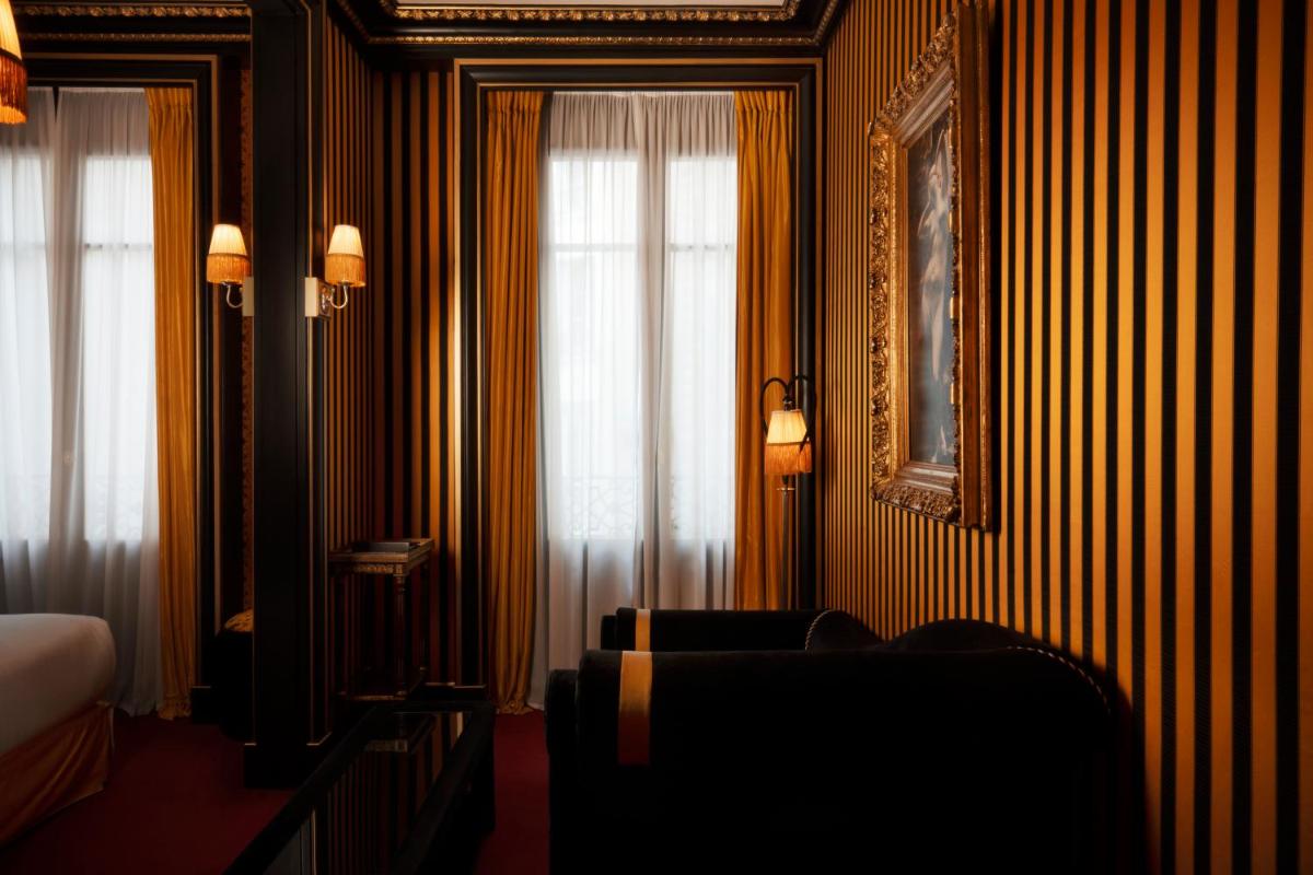 Un ou plusieurs lits dans un hébergement de l'établissement Maison Souquet, Hotel & Spa