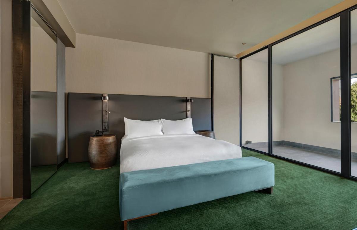 Uma cama ou camas num quarto em Hilton Porto Gaia