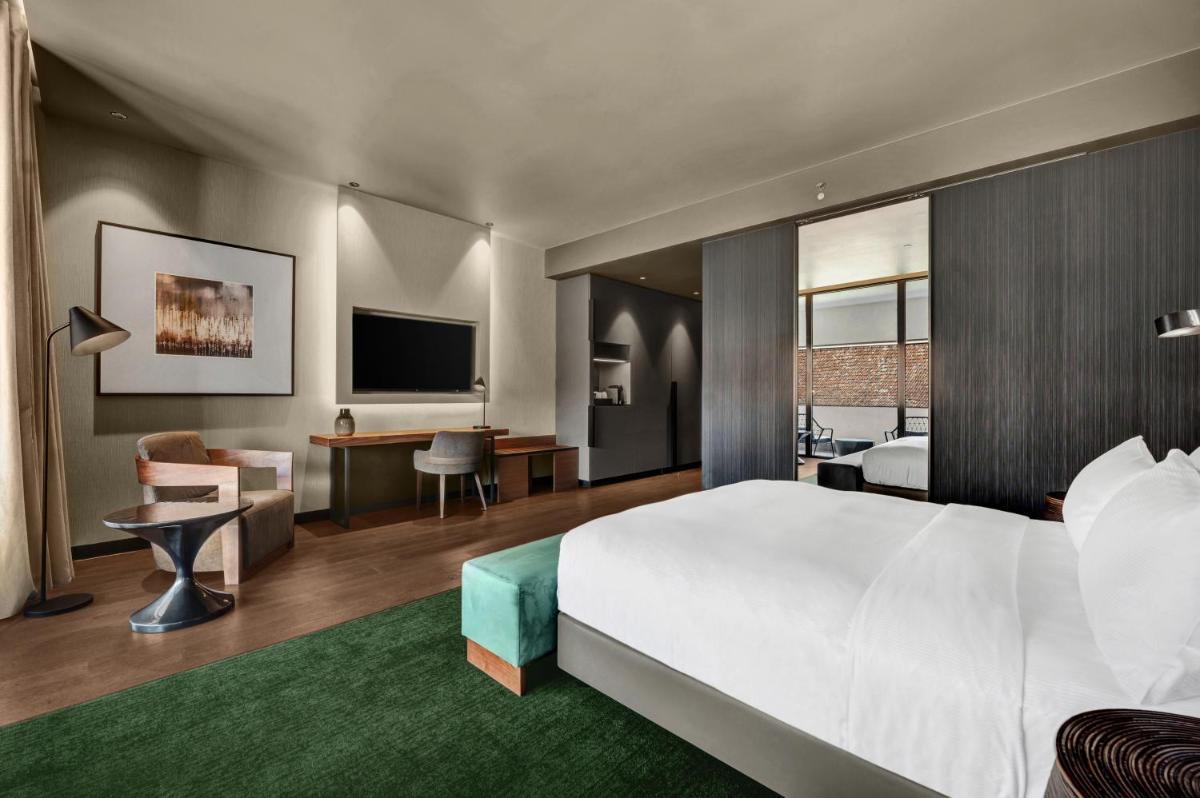 Uma cama ou camas num quarto em Hilton Porto Gaia