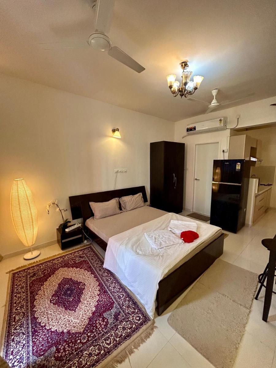 Good Stay Pool view stylish Studio Apartment,6km from Airport, 307 - Housity